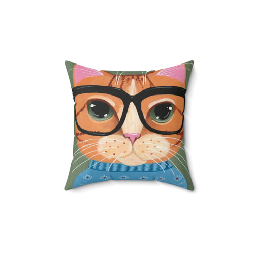 Cute ginger cat wearing a Christmas sweater on a decorative pillow