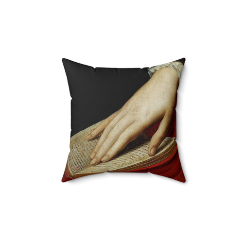 Renaissance illuminated manuscript pillow with woman's hand on book