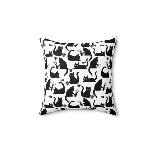 Funny cat pillow with a hand-drawn design of cats knocking things over