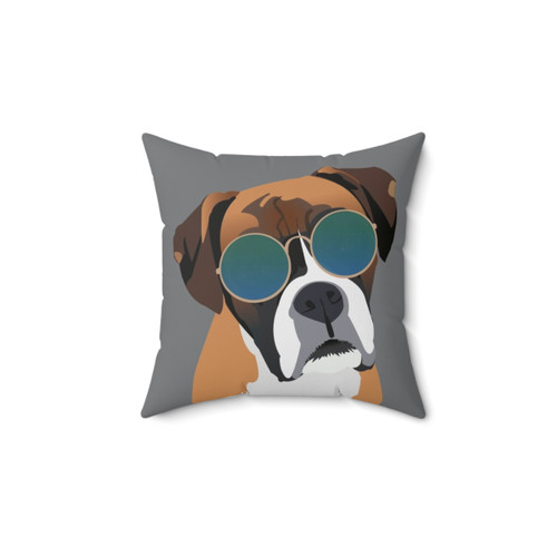 Boxer dog wearing sunglasses on a decorative pillow