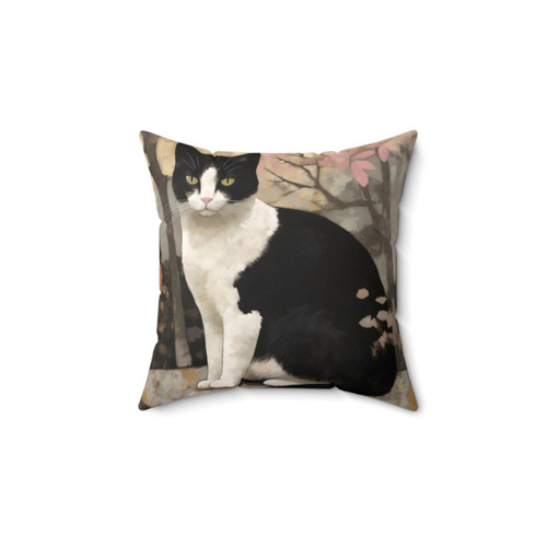 Tuxedo cat pillow with a watercolor nature scene