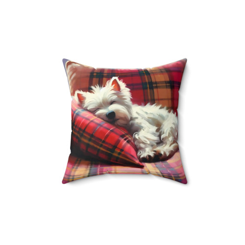 Westie dog sleeping on a tartan pattern pillow