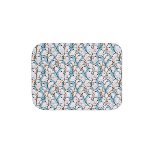 Blue Sherpa blanket featuring a cozy design with Quaker parakeets