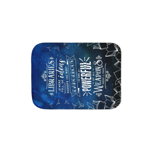 Cozy Sherpa blanket with whimsical book-themed designs