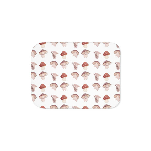 Soft and plush sherpa blanket with a whimsical mushroom design