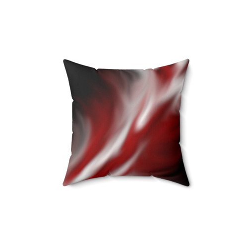 Decorative red and white pillow with abstract pattern