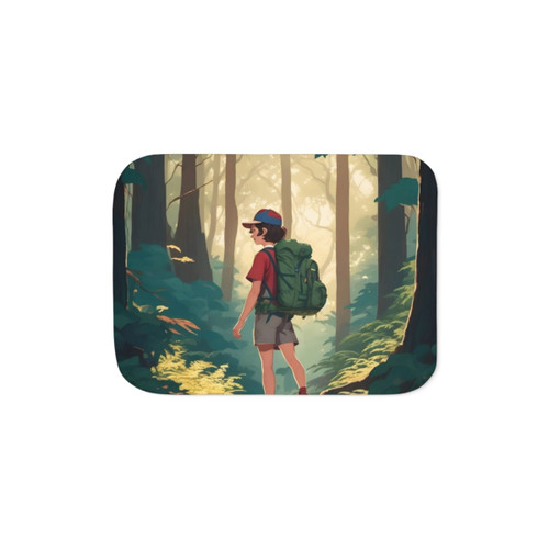 Hiker enjoying a cozy Sherpa blanket in a forest