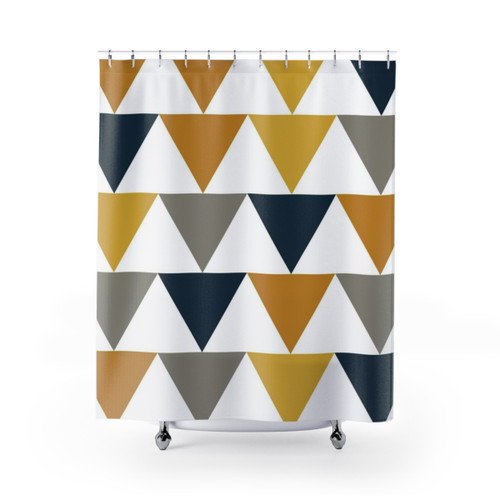 Geometric pattern shower curtains with mustard, blue, and grey triangles