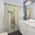 Colorful and whimsical shower curtain with giraffes riding tandem bicycles