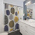 Abstract navy and mustard shower curtain with circle pattern