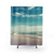 Colorful swimmer shower curtain with beach and ocean scenes