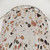 Terrazzo pattern shower curtains in beige, white, and brown colors