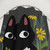 Black cat with flowers shower curtain