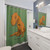 Dinosaur-themed shower curtain with T-Rex graphic