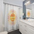 Sunshine-themed shower curtain for a happy, summer bathroom