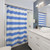 Light blue and white striped shower curtains