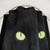 Black cat portrait shower curtain featuring feline eyes and whiskers
