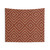 Rust-colored tapestry with bohemian geometric pattern