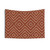 Rust-colored tapestry with bohemian geometric pattern