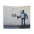 Banksy graffiti tapestry featuring a smiling robot and barcodes