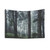 Misty forest tapestry with trees covered in blue fog