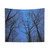 Ethereal Night Sky Tapestry with Silhouetted Trees