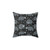 Decorative pillow with a repeating raccoon pattern