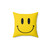 Happy face pillow with a bright yellow smiling design