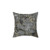 Marble patterned throw pillow in black, gold, and grey
