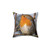 Pillow featuring an illustration of a robin redbreast perched on a tree branch