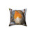 Pillow featuring an illustration of a robin redbreast perched on a tree branch