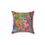 Colorful floral throw pillow with pink, blue, orange, red, green, and yellow flowers