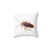Realistic illustration of a cockroach on a decorative pillow