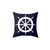 Navy blue pillow with white ship steering wheel design