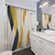 Minimalist geometric shower curtains in mustard, navy, and blush tones