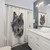 Wolf Persevere Shower Curtains featuring a watercolor design of a wolf