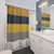Striped shower curtains in mustard, grey and navy colors