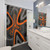 Adobe-inspired orange, grey and black shower curtain