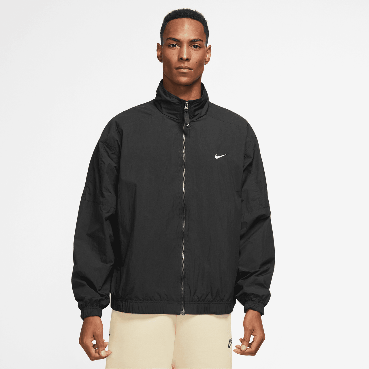 nike ruched sleeve swoosh zip jacket in black