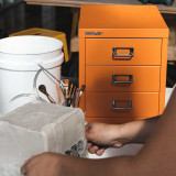 Orange Bisley 3-Drawer Desktop MultiDrawer in a ceramics studio