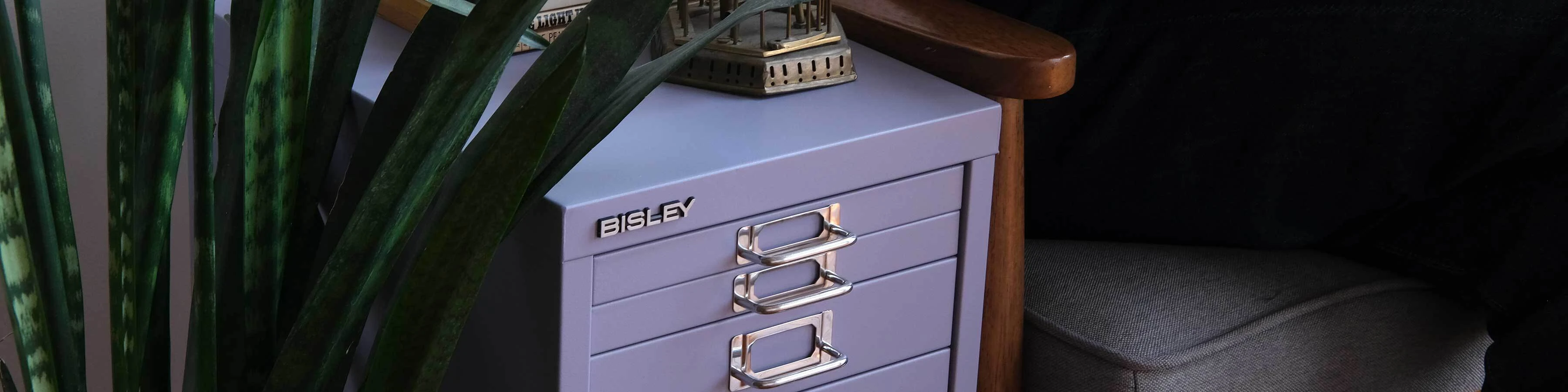 Bisley 8-Drawer MultiDrawer in Lilac closeup and next to a plant and chair