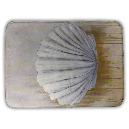White Seashell on Yellow Bath Mat