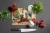 Cozy Christmas Chocolate Lab Glass Cutting Board