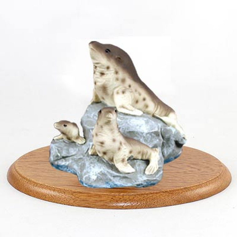 Seal Family Figurine on Wood Base