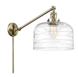 manufacturer_finish:Antique Brass|manufacturer_glass:Clear Deco Swirl X-Large Bell|light_output:220.00lm|color_temperature:2200K|cri:99