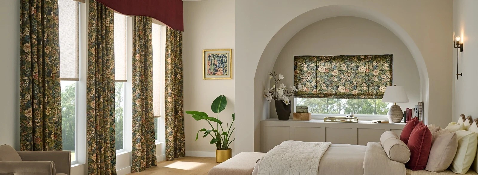 Graber roller shades and drapery in a designed interior