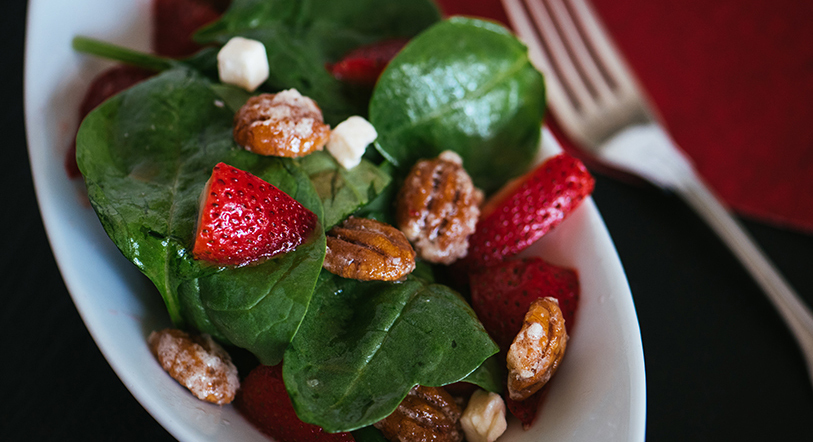 Summer salad with strawberries, feta, and pecans