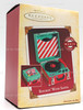 Hallmark Keepsake Ornament Rockin with Santa 2005