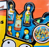 TheSimpsons Chess Set with Laminated Fold-Up Playing Board Cardinal 52971