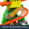 Hot Wheels City T-Rex Blaze Battle & 1:64 Scale Die-Cast Toy Car​​